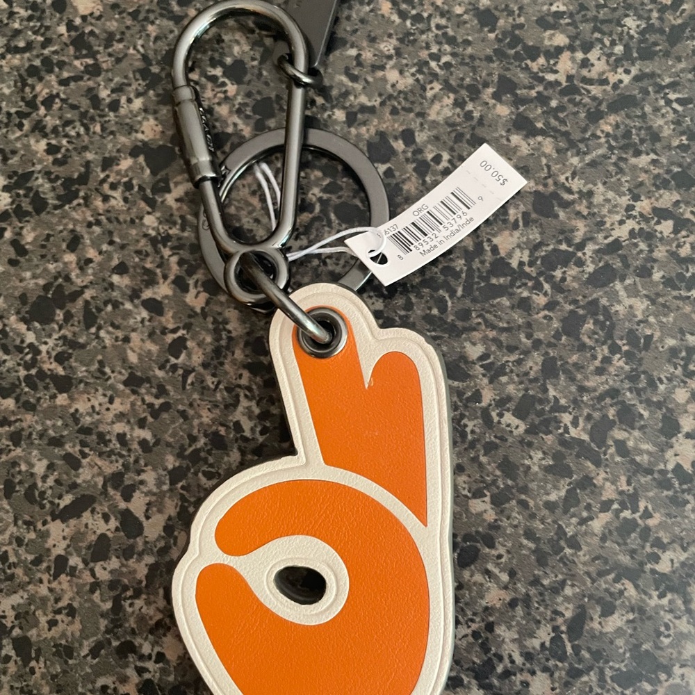 Coach Orange and White Hand Keychain